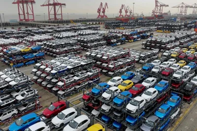 This aerial photograph taken, April 16, shows electric cars for export stacked at the international container terminal of Taicang Port in Suzhou, in China's eastern Jiangsu Province. AFP-Yonhap