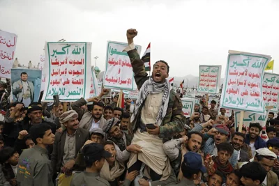 Houthi supporters attend a rally against the US and Israel in Sana'a, July 19, 2024