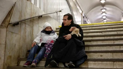 People take shelter inside a metro station during a Russian military attack, amid Russia's attacks on Ukraine, in Kyiv, Ukraine November 28, 2024. REUTERS/Thomas Peter