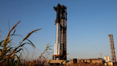 SpaceX's next-generation Starship spacecraft sits atop its powerful Super Heavy rocket booster on Saturday ahead of a sixth flight test at the company's launchpad near Brownsville, Texas.