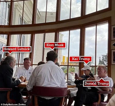 Musk can be seen here dining with the ex-president, his granddaughter Kai, and advisors