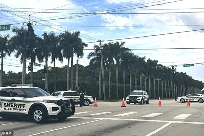 Palm Beach Sheriff's Department vehicles posted up outside Trump International Golf Club on Sunday after gunshots were reported in the vicinity of where the former president was golfing