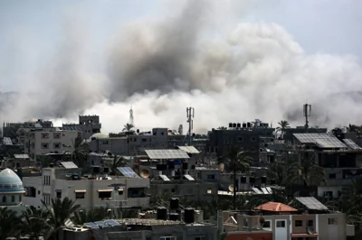 DIRECT HIT Smoke rises during an Israeli airstrike in the city of Deir el-Balah, central Gaza Strip, on July 27, 2024. AFP PHOTO