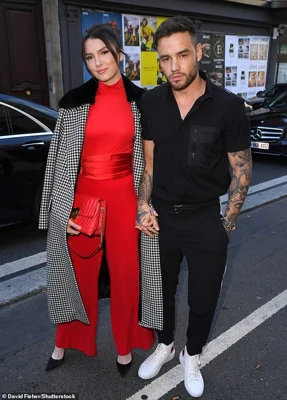 Reps for Liam Payne's ex- fiancée Maya Henry told DailyMail.com: 'Right now she is obviously in shock.' (pictured: Payne and Henry in 2019 at Paris Fashion Week)