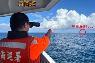 A photo released by the Taiwan Coast Guard shows coast guard personnel sighting a Chinese ship during drills by the PLA.