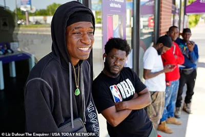 The city has been in turmoil over the about 15,000 migrants who have arrived in recent years. Alimemby Estimable, 19, is seen discussing being Haitian in Springfield, Ohio