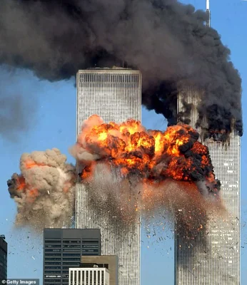 Hijacked United Airlines Flight 175 from Boston crashes into the south tower of the World Trade Center and explodes at 9:03 a.m. on September 11