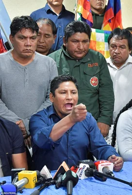 Pacifico Choque, deputy of the Movement for Socialism (MAS) party and supporter of Bolivia's former President Evo Morales addresses the media after Morales' said that his vehicle was fired upon on Sunday