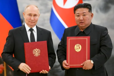 Vladimir Putin and Kim Jong-un during a signing ceremony of their new partnership in Pyongyang, North Korea, on 19 June 2024