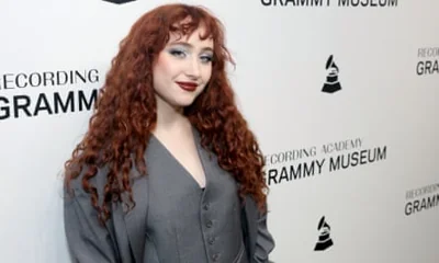 a woman with long red hair