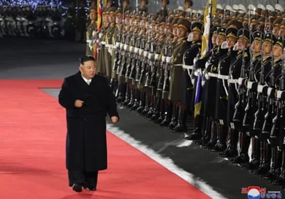 North Korea’s leader Kim Jong-un inspects a guard of honour during a military parade in February 2023.