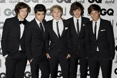 One Direction's Liam Payne (second from right) poses for a photo with fellow band members Harry Styles, Zayn Malik, Niall Horan and Louis Tomlinson at the GQ Men of the Year Awards in London, Sept. 6, 2011. AP PHOTO