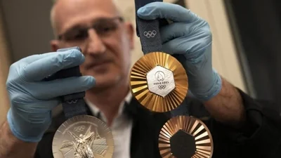 The Paris 2024 Olympics are offering athletes something truly unique: medals that feature authentic pieces of the iconic Eiffel Tower. (AP photo)