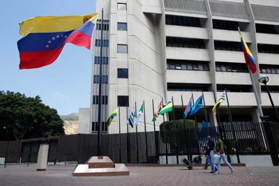 A Venezuelan flag waves outside Venezuela's Supreme Justice Tribunal, the country's highest court, in 2019 in Caracas.