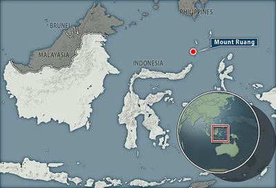 Tsunami alert as Indonesian 'Ring of Fire' volcano spectacularly erupts with three-mile high plume of smoke and ash