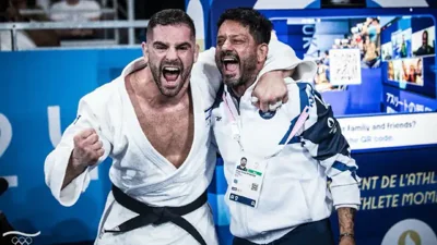 Peter Paltchik (L) with his coach Oren Smadja