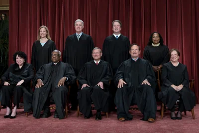 Members of the Supreme Court sit for a group portrait at the Supreme Court building in Washington, Oct. 7, 2022. Currently, nine justices sit on the court and the last time it was expanded was more than 150 years ago.