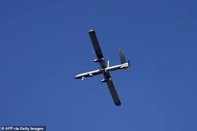 An Israeli military drone is seen flying over the Gaza Strip earlier this year. Unmanned aerial vehicles are playing a growing part in modern warfare