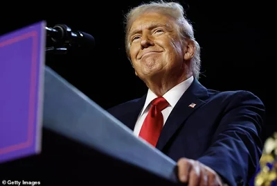 Donald Trump arrives to speak during an election night event at the Palm Beach Convention Center on Thursday in West Palm Beach, Florida