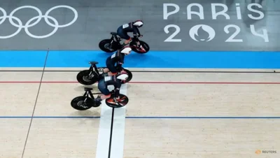 Britain's women win track cycling team sprint gold