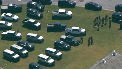 Police are seen outside Apalachee High School in Winder, Ga., on Sept. 4, 2024.