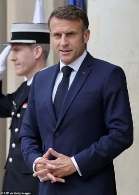 French President Emmanuel Macron is pictured this morning at the Elysee palace in Paris