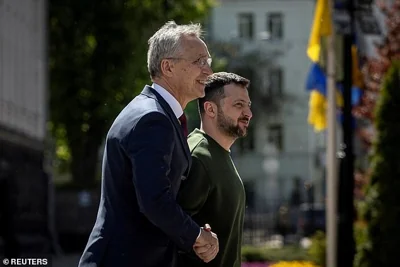 NATO Secretary General Jens Stoltenberg, seen here with kraine's President Volodymyr Zelenskiy, has also indicated it might be time for a change in policy