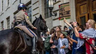 Mounted police work to contain demonstrators protesting the war in Gaza at the University of Texas at Austin on April 24, 2024 in Austin, Texas
