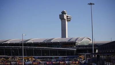 TSA has reviewed JFK airport video as they await return of stowaway from Paris