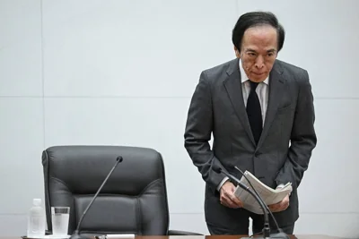 RETAINED Bank of Japan (BoJ) Governor Kazuo Ueda bows during a press conference at the BoJ headquarters in Tokyo on Friday, April 26, 2024. The BoJ decided to keep the very low interest rates unchanged. AFP PHOTO