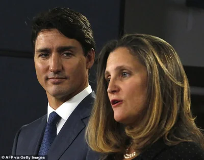 Without being prompted, Dr Chalmers praised Canada's outgoing Finance Minister Chrystia Freeland (right), whose resignation threatens to bring down Prime Minister Justin Trudeau's (left) nine-year leadership of his country