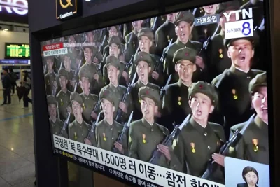 FIGHTING A FOREIGN WAR A television screen shows file footage of North Korean soldiers during a news program at the Seoul Railway Station in South Korea’s capital Seoul on Oct. 18, 2024. AP PHOTO