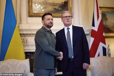 Pictured: Starmer and Zelensky shake hands during a meeting at 10 Downing Street on July 19