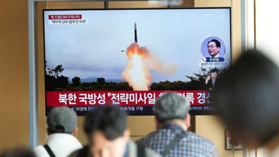 A TV screen shows an image of North Korea's an intercontinental ballistic missile launch during a news program at the Seoul Railway Station in Seoul, Oct. 31, 2024.