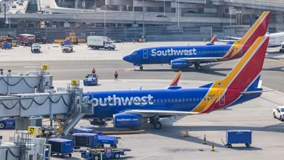 Passengers on parked Southwest plane forced to evacuate after cell phone, airplane seat catch fire