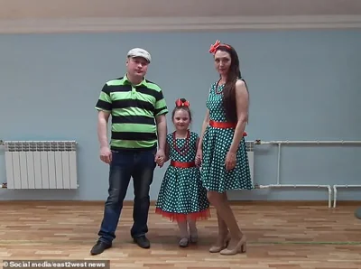 Mikhail Pichugin, 45, with his family including ex-wife Ekaterina, 38.