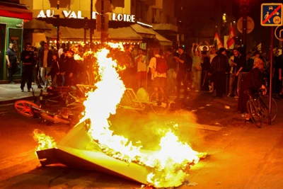 Barricades designed to keep crowds under control were torched