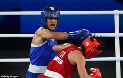 Amid the controversy surrounding her gender, the Algerian booked her place in the women's welterweight final at the Olympics on Tuesday