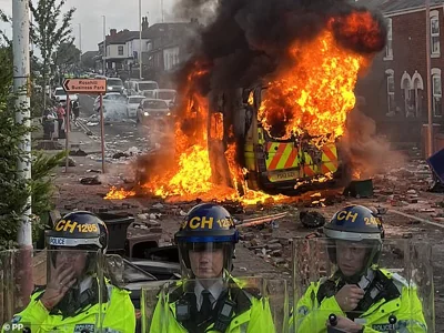 A police van was set on fire near a mosque in Southport on Tuesday evening as riots broke out