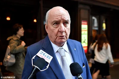 Veteran broadcaster and former Wallabies coach Alan Jones has been arrested at his apartment in Sydney