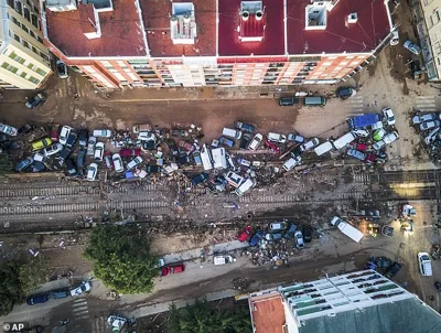 Vehicles pile up in the streets caused by late Tuesday and early Wednesday storm that left hundreds dead or missing in Alfafar, Valencia