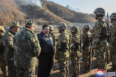 FIT FOR FIGHTING? North Korea’s leader Kim Jong Un (center left) meets soldiers during a visit to a western operational training base in the country on March 6, 2024. FILE PHOTO FROM THE KOREAN CENTRAL NEWS AGENCY/KOREA NEWS SERVICE VIA AP