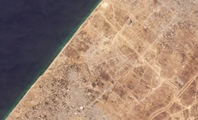 a satellite image shows land that has been cleared of buildings