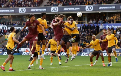 John Stones headed Man City to all three points in late drama at Molineux