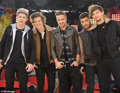 Payne rose to fame with band One Direction. He is pictured with his bandmates in 2013