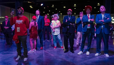 Supporters of Republican presidential candidate Donald Trump watch election results as they attend his election night event at the West Palm Beach Convention Center in West Palm Beach, Florida, on November 5, 2024. — AFP