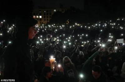 One Direction fans gather to pay tribute to Liam Payne, at the Monument of the Revolution, in Mexico City on October 17