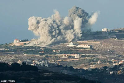 Smoke billows after an Israeli Air Force air strike on a village in southern Lebanon