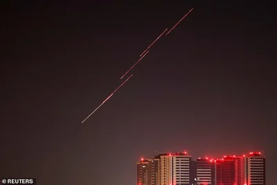 Russia's demands come as it pounded Kyiv in a huge drone attack. Picture: Tracers are seen in the night sky as Ukrainian servicemen fire at the drone during a Russian drone strike, amid Russia's attack on Ukraine, in Kyiv, Ukraine today