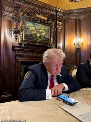 Republican presidential nominee and former U.S. President Donald Trump speaks as he participates in an interview with billionaire entrepreneur Elon Musk on the social media platform X, at Mar-a-Lago in Palm Beach